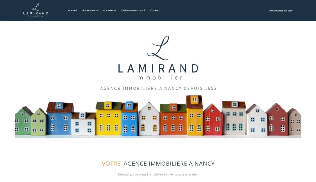 Capture de la page d’accueil du site Lamirand Immobilier, agence immobilière à Nancy, avec logo et visuel de maisons colorées.